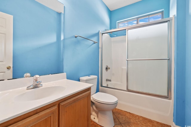 2384 Covington Dr, Myrtle Beach, SC 29579 - bathroom featuring toilet, vanity, combined bath / shower with glass door, and tile patterned floors