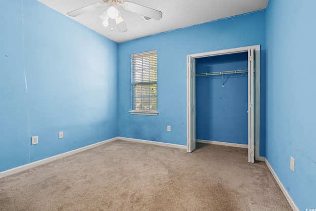2384 Covington Dr, Myrtle Beach, SC 29579 - unfurnished bedroom with carpet flooring, a closet, baseboards, and ceiling fan