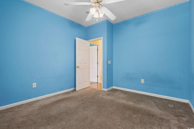 2384 Covington Dr, Myrtle Beach, SC 29579 - spare room featuring carpet flooring, a ceiling fan, and baseboards