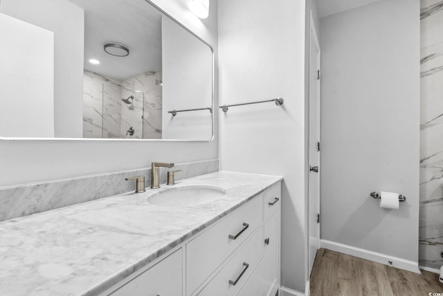 315 73rd Ave N Unit 2, Myrtle Beach, SC 29572 - full bath with vanity, a marble finish shower, wood finished floors, and recessed lighting