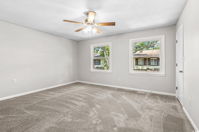 315 73rd Ave N Unit 2, Myrtle Beach, SC 29572 - carpeted spare room with plenty of natural light, ceiling fan, and a textured ceiling