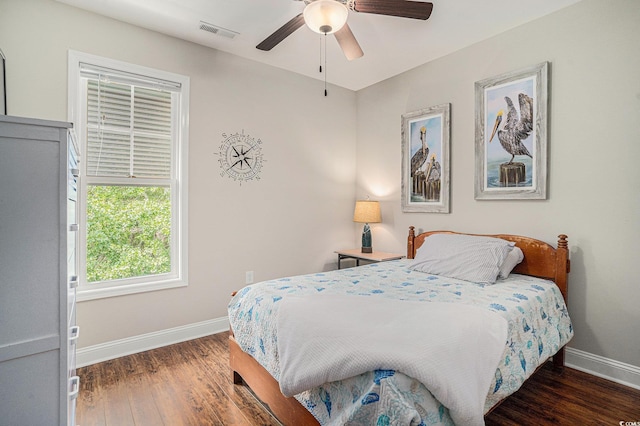 58 Fathom Ln, Murrells Inlet, SC 29576 - bedroom featuring baseboards, wood finished floors, and ceiling fan