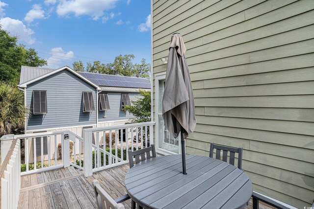 58 Fathom Ln, Murrells Inlet, SC 29576 - wooden deck with outdoor dining area