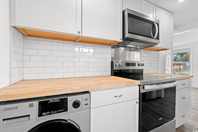 1004 Georgetown St, Marion, SC 29571 - kitchen featuring washer / dryer, appliances with stainless steel finishes, butcher block counters, white cabinetry, and decorative backsplash