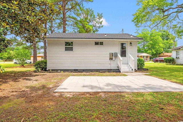 1004 Georgetown St, Marion, SC 29571 - rear view of property with crawl space, a lawn, a patio area, and entry steps
