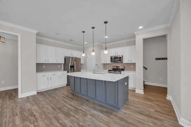 2080 Silver Island Way, Murrells Inlet, SC 29576 - kitchen with stainless steel appliances, a sink, white cabinetry, light countertops, and tasteful backsplash