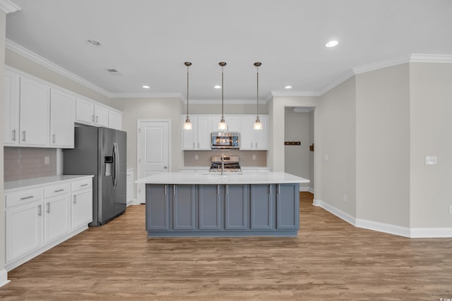 2080 Silver Island Way, Murrells Inlet, SC 29576 - kitchen with stainless steel appliances, white cabinets, light wood-style floors, light countertops, and recessed lighting