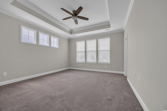 2080 Silver Island Way, Murrells Inlet, SC 29576 - empty room with crown molding, a tray ceiling, a ceiling fan, carpet, and baseboards