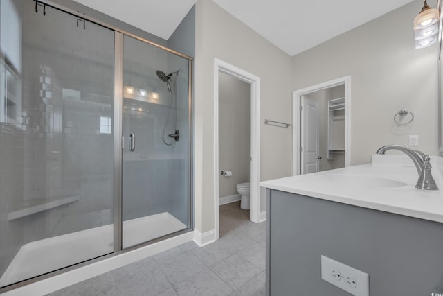 2080 Silver Island Way, Murrells Inlet, SC 29576 - bathroom featuring toilet, a shower stall, vanity, and tile patterned flooring