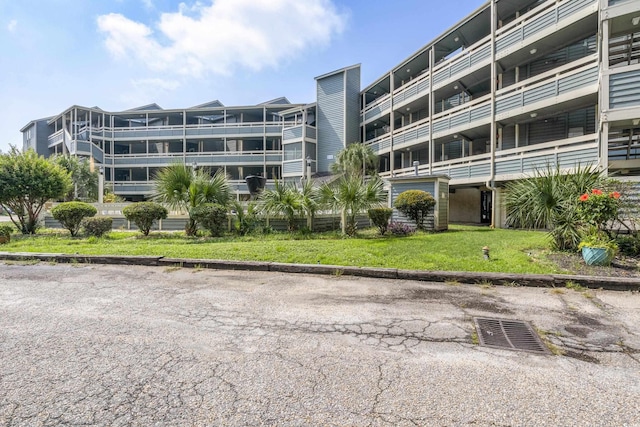 1101 Possum Trot Rd Unit D201, North Myrtle Beach, SC 29582 - view of apartment building / complex