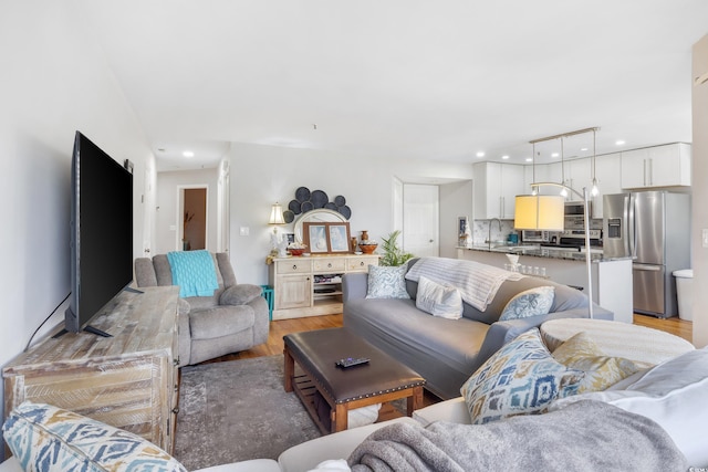 1101 Possum Trot Rd Unit D201, North Myrtle Beach, SC 29582 - living room featuring light wood finished floors and recessed lighting