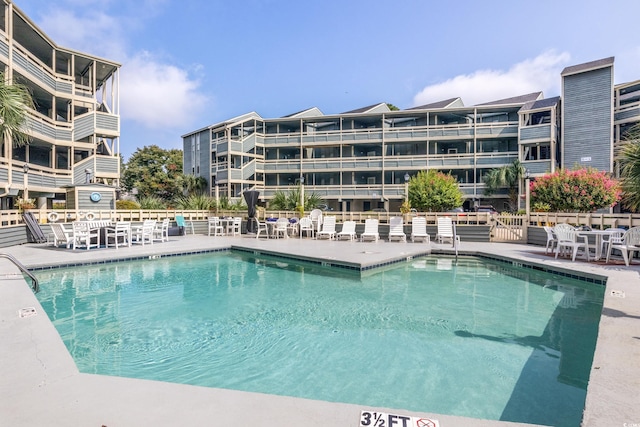 1101 Possum Trot Rd Unit D201, North Myrtle Beach, SC 29582 - community pool with a patio