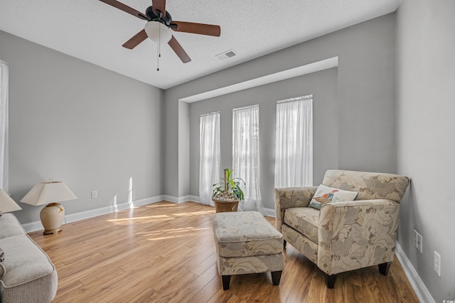 4232 Pointer Ct, Myrtle Beach, SC 29579 - sitting room featuring a ceiling fan, wood finished floors, and baseboards