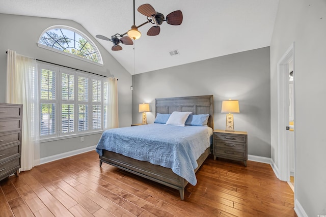 4232 Pointer Ct, Myrtle Beach, SC 29579 - bedroom featuring hardwood / wood-style floors, baseboards, ceiling fan, and high vaulted ceiling