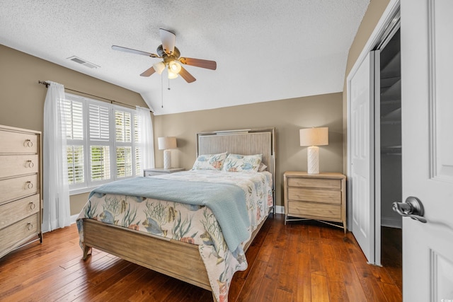 4232 Pointer Ct, Myrtle Beach, SC 29579 - bedroom featuring vaulted ceiling, hardwood / wood-style floors, a textured ceiling, ceiling fan, and baseboards