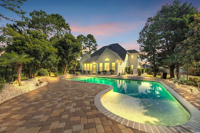 4232 Pointer Ct, Myrtle Beach, SC 29579 - pool at dusk featuring a patio