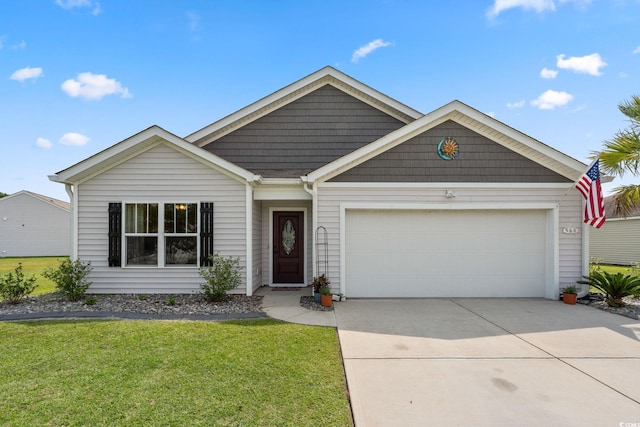 568 Mossbank Loop, Longs, SC 29568 - view of front of house featuring driveway, an attached garage, and a front lawn