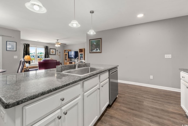 568 Mossbank Loop, Longs, SC 29568 - kitchen featuring stainless steel dishwasher, white cabinetry, a ceiling fan, dark wood-style flooring, and decorative light fixtures