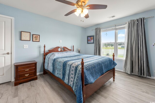 568 Mossbank Loop, Longs, SC 29568 - bedroom featuring wood finished floors and a ceiling fan