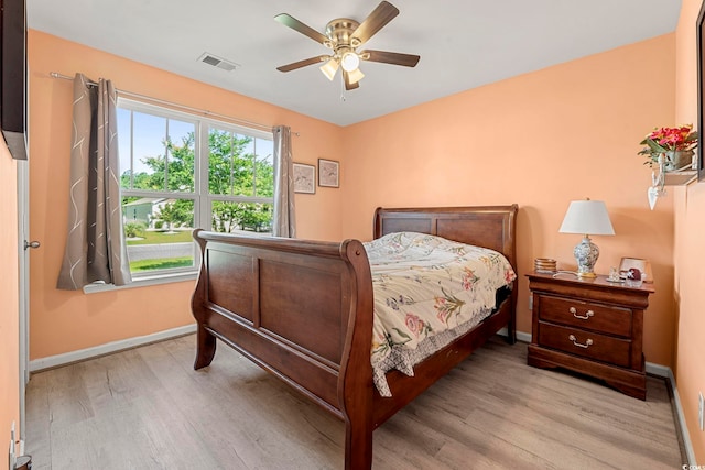 568 Mossbank Loop, Longs, SC 29568 - bedroom with light wood finished floors and a ceiling fan