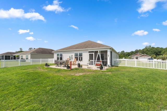 568 Mossbank Loop, Longs, SC 29568 - back of property with a patio area, a fenced backyard, a sunroom, and roof with shingles