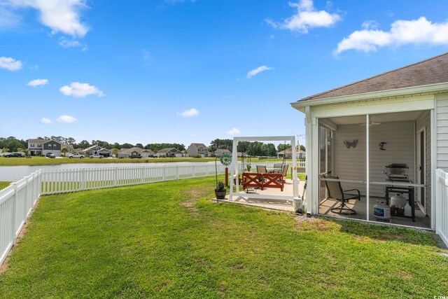 568 Mossbank Loop, Longs, SC 29568 - fenced backyard featuring a sunroom, a residential view, and a water view