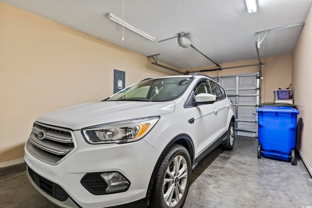 1222 Midtown Village Dr, Conway, SC 29526 - garage with a garage door opener and baseboards