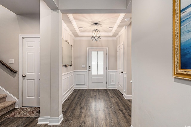 1741 Parish Way, Myrtle Beach, SC 29577 - entryway with dark wood finished floors, a chandelier, a raised ceiling, stairway, and ornamental molding