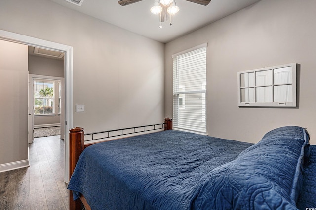 1741 Parish Way, Myrtle Beach, SC 29577 - bedroom with hardwood / wood-style floors, baseboards, and a ceiling fan