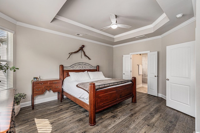 1741 Parish Way, Myrtle Beach, SC 29577 - bedroom featuring a tray ceiling, dark wood-style flooring, baseboards, crown molding, and ensuite bath
