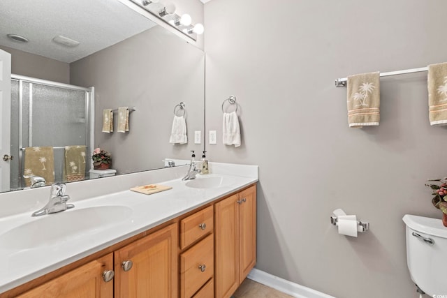 592 Riverward Dr Unit 592, Myrtle Beach, SC 29588 - full bath with toilet, double vanity, a shower stall, and baseboards