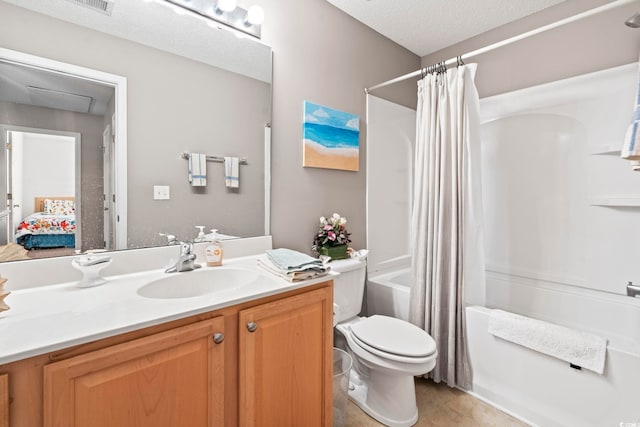 592 Riverward Dr Unit 592, Myrtle Beach, SC 29588 - bathroom with vanity, shower / bathtub combination with curtain, toilet, tile patterned flooring, and a textured ceiling