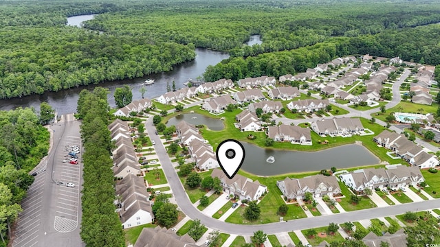592 Riverward Dr Unit 592, Myrtle Beach, SC 29588 - aerial overview of property's location with a forest, a large body of water, and nearby suburban area