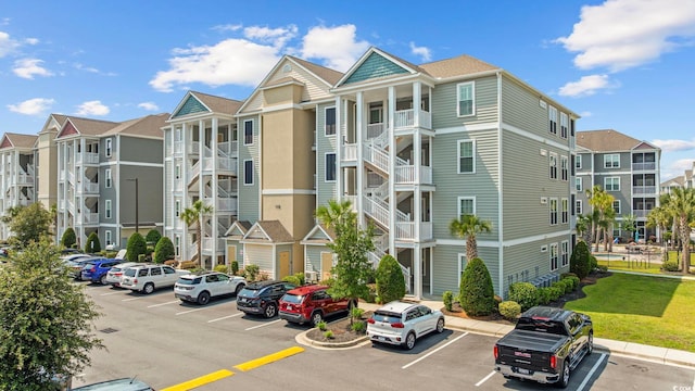 172 Ella Kinley Cir Unit 101, Myrtle Beach, SC 29588 - view of property with uncovered parking and a residential view