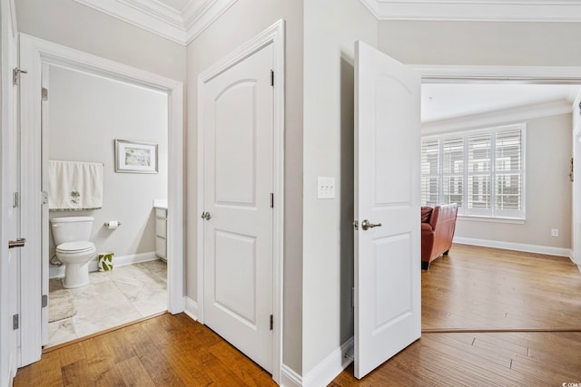 172 Ella Kinley Cir Unit 101, Myrtle Beach, SC 29588 - corridor featuring crown molding, wood finished floors, and baseboards