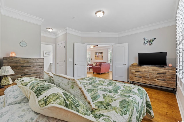 172 Ella Kinley Cir Unit 101, Myrtle Beach, SC 29588 - bedroom with crown molding and wood finished floors