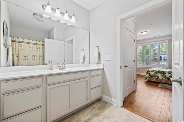 172 Ella Kinley Cir Unit 101, Myrtle Beach, SC 29588 - bathroom featuring vanity and baseboards