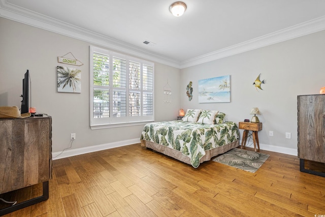 172 Ella Kinley Cir Unit 101, Myrtle Beach, SC 29588 - bedroom featuring ornamental molding and wood finished floors