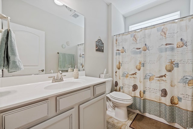 172 Ella Kinley Cir Unit 101, Myrtle Beach, SC 29588 - full bathroom with vanity, toilet, tile patterned floors, and a shower with shower curtain