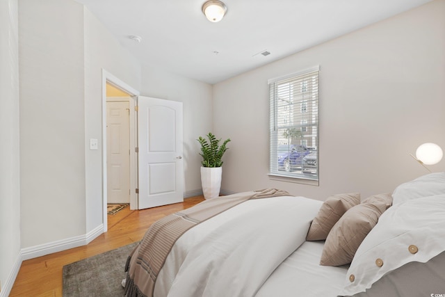 172 Ella Kinley Cir Unit 101, Myrtle Beach, SC 29588 - bedroom featuring light wood-style flooring and baseboards