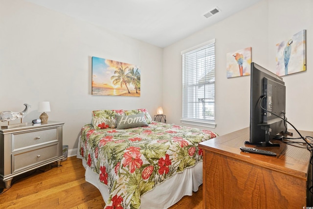 172 Ella Kinley Cir Unit 101, Myrtle Beach, SC 29588 - bedroom featuring wood finished floors