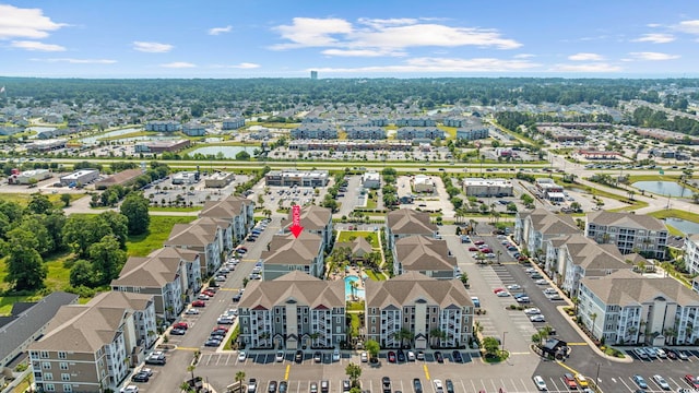 172 Ella Kinley Cir Unit 101, Myrtle Beach, SC 29588 - aerial perspective of suburban area with a large body of water