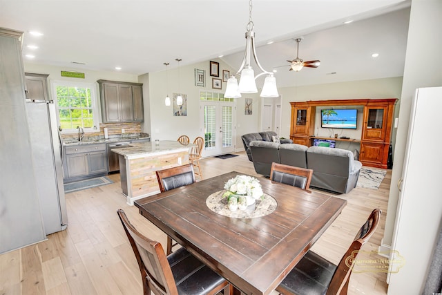 1013 Happy Ln, Galivants Ferry, SC 29544 - dining space featuring lofted ceiling, ceiling fan, light wood finished floors, recessed lighting, and french doors