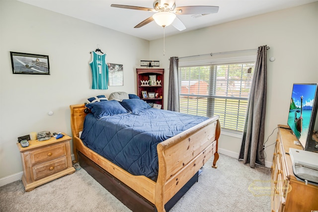 1013 Happy Ln, Galivants Ferry, SC 29544 - bedroom with baseboards, light colored carpet, and a ceiling fan