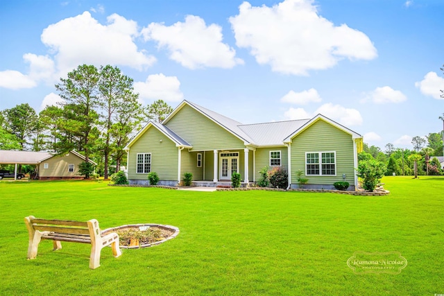 1013 Happy Ln, Galivants Ferry, SC 29544 - view of front of home featuring a front lawn and covered porch