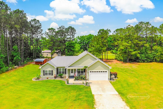 1013 Happy Ln, Galivants Ferry, SC 29544 - view of front facade featuring an attached garage, a front yard, driveway, and view of scattered trees