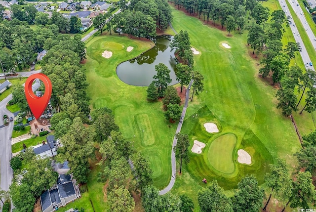 1880 Plantation Dr, Myrtle Beach, SC 29577 - aerial view of property and surrounding area with a large body of water, a tree filled landscape, and a golf club