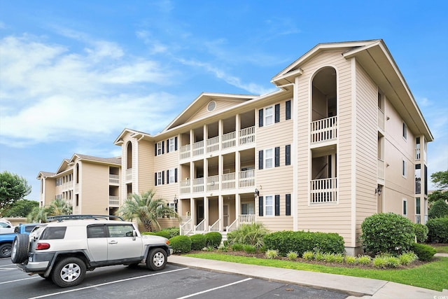 1900 Duffy St Unit L4, North Myrtle Beach, SC 29582 - view of apartment building / complex with uncovered parking