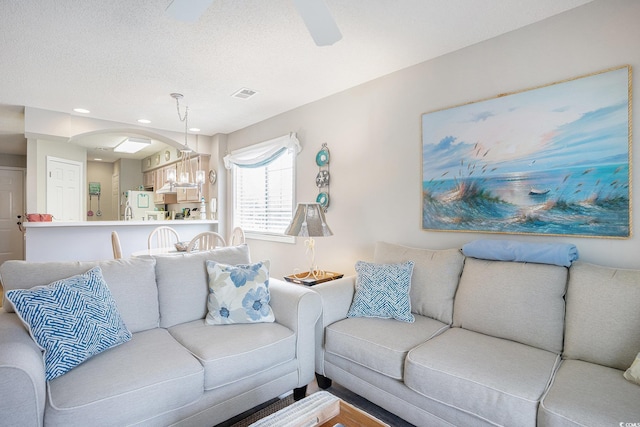 1900 Duffy St Unit L4, North Myrtle Beach, SC 29582 - living room with recessed lighting and a textured ceiling