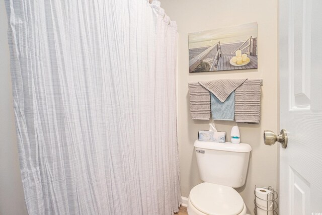 1900 Duffy St Unit L4, North Myrtle Beach, SC 29582 - bathroom featuring toilet and baseboards